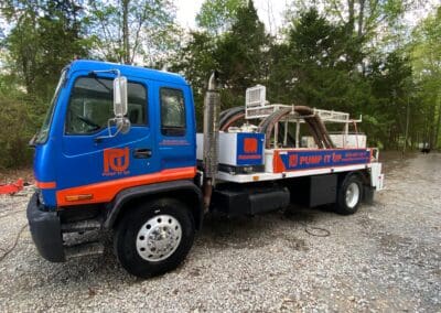 Side view of a Pump It Up Concrete truck