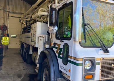 Pump It Up Concrete work truck in garage