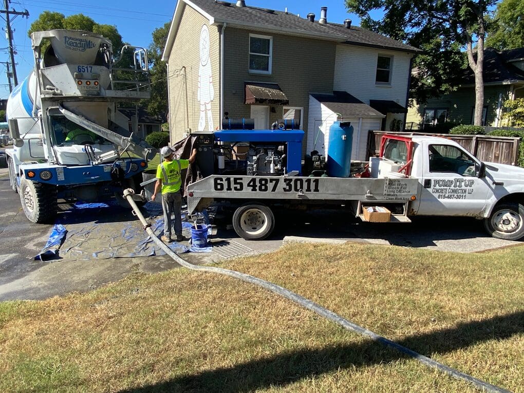 fixing a driveway in front of a house