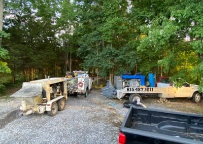 picture of trucks and equipment parked at a work site