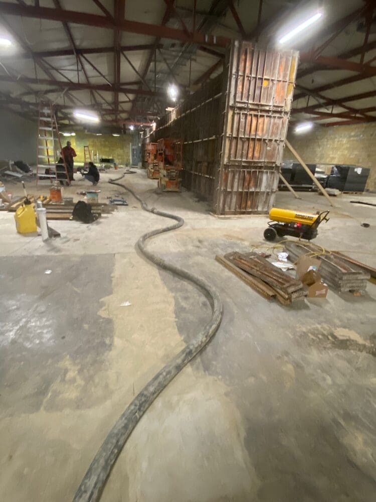 picture of trucks and equipment parked at a work site